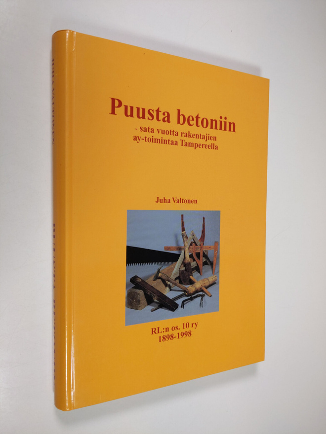 Juha Valtonen : Puusta betoniin : sata vuotta rakentajien...