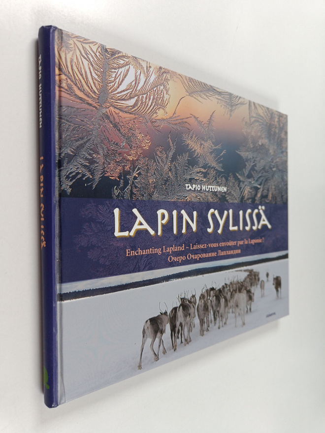 Tapio Huttunen : Lapin sylissä = Enchanting Lapland = Lai...