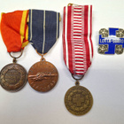 Kolme mitalia ja Lotta Svärd pinssi - pikkukuva 1
