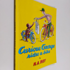 Hans Augusto Rey : Curious George Rides a Bike - pikkukuva 1