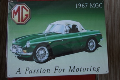 Iso peltikyltti MG -67