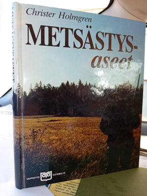 Holmgren : Metsästysaseet ( SIS POSTIKULU )