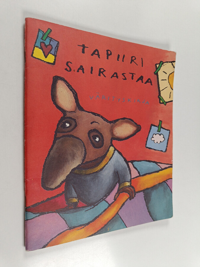 Julia Vuori ym. : Tapiiri sairastaa : värityskirja