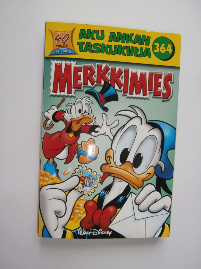 AKU ANKAN TASKUKIRJA 364 MERKKIMIES