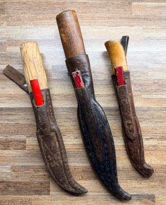 Kolme vanhaa timpurin puukkoa