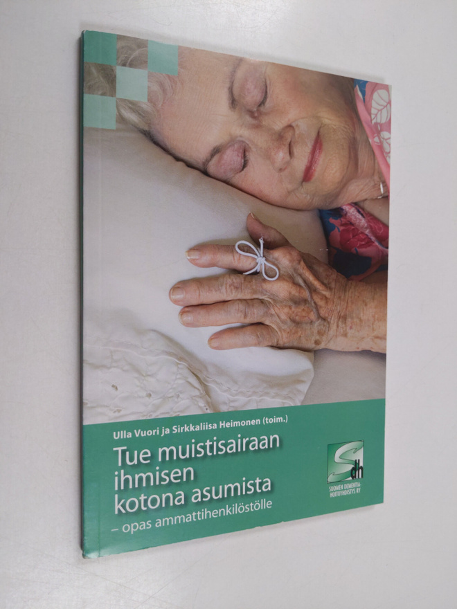 Tue muistisairaan ihmisen kotona asumista : opas ammattih...