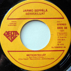 Jarmo Seppälä ja Seikkailijat - metrontekijät  -  7" - pikkukuva 2