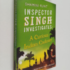 Shamini Flint : Inspector singh investigates : a curious ... - pikkukuva 1