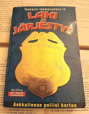 Aku Ankan taskukirja • teemanumero 14: Laki ja järjestys