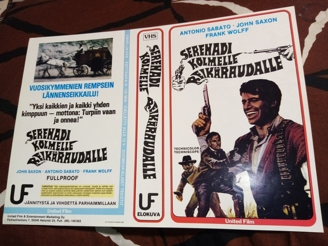 VHS kansipaperi Serenadi kolmelle reikäraudalle