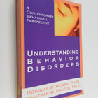Douglas W. Woods : Understanding behavior disorders : a c... - pikkukuva 1
