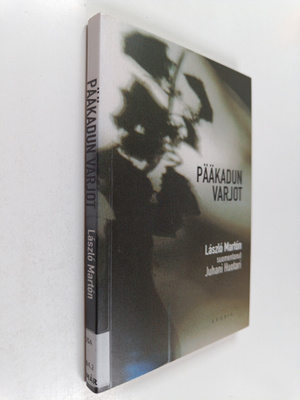Laszlo Marton : Pääkadun varjot