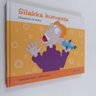 Annamari Saure : Silakka korvassa : huumorikertomuksia - pikkukuva 1