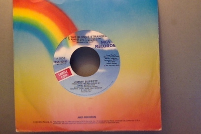 JIMMY BUFFETT :: WHO'S THE BLONDE STRANGER ? :: VINYYLI   7"