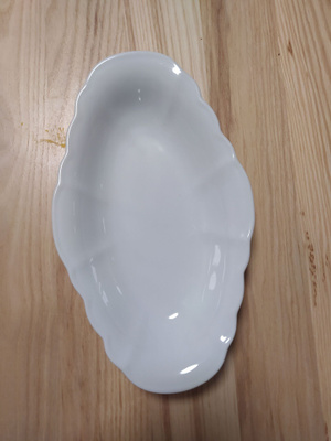 Tarjoilukulho posliinia