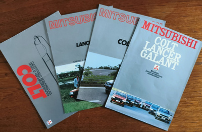Mitsubishi- autoesitteet 4 kpl 1980- luku
