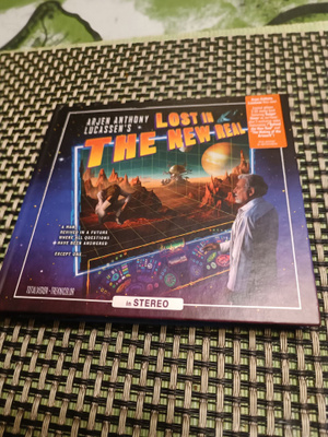 Arjen Anthony Lucassen's:Lost In The New Real 2cd.