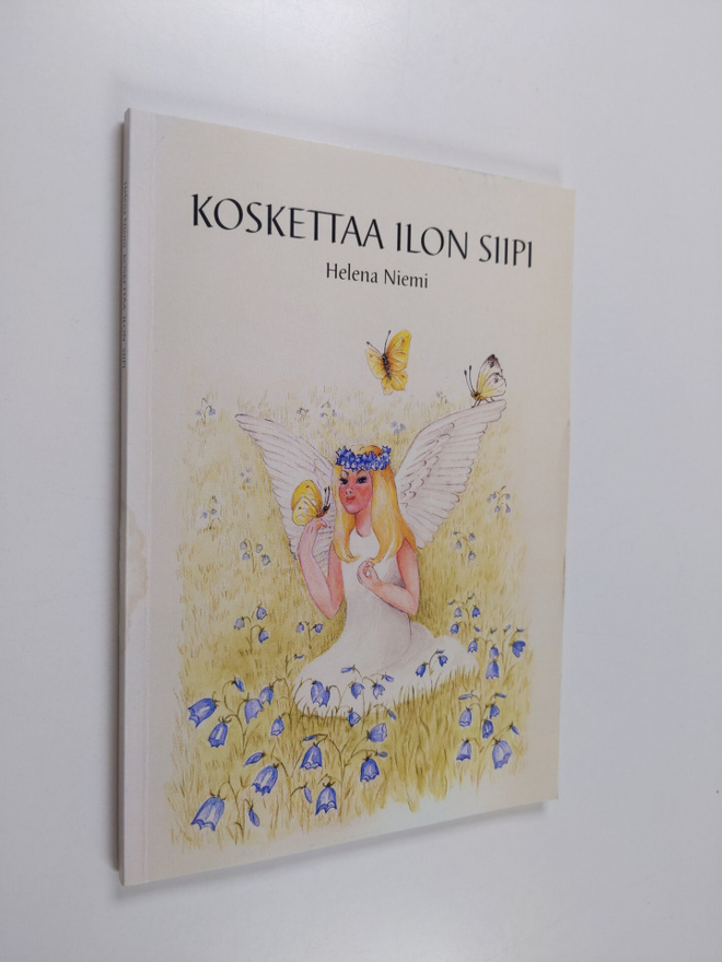 Helena Niemi : Koskettaa ilon siipi