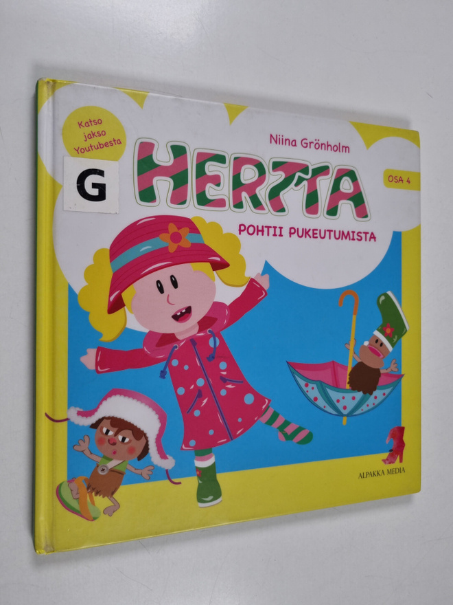 Niina Grönholm : Hertta pohtii pukeutumista