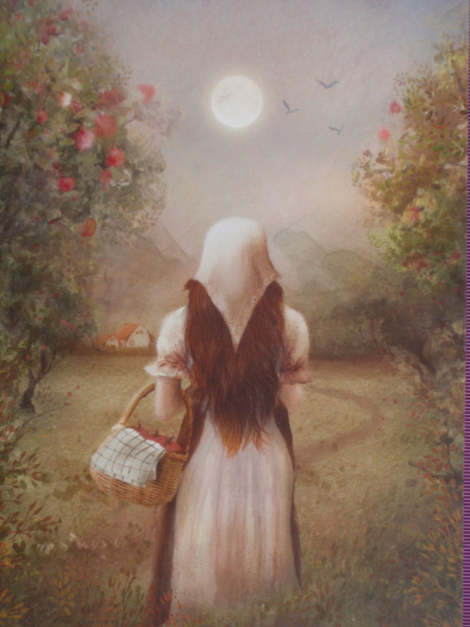 Iris Esther tyttö kerännyt omenat koriin syysiltana