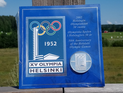 Hopeanvärinen Olympia 1952 kolikko. Halkaisija - 36 mm.