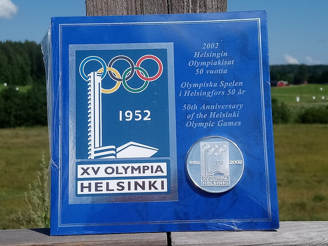 Hopeanvärinen Olympia  1952 kolikko.  Halkaisija - 36 mm.