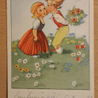 O. Furuhjelm: tyttö ja poika kukkakedolla, kulkenut 1934 - pikkukuva 1