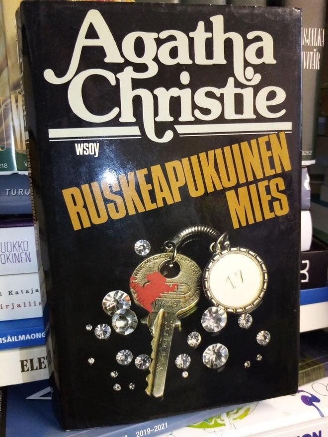 Agatha Christie :  Ruskeapukuinen mies ( SIS POSTIKULU)