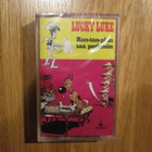 LUCKY LUKE Ran-tan-plan saa perinnön c-kasetti * AVAAMATON - pikkukuva 1