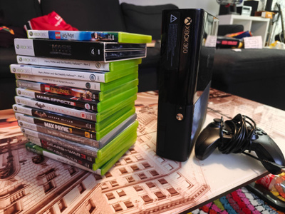 Xbox 360 + Langallinen ohjain ja 15 peliä.