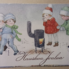 Lapset lämmittelevät ulkona kamiinan äärellä, p. 1929 - pikkukuva 1