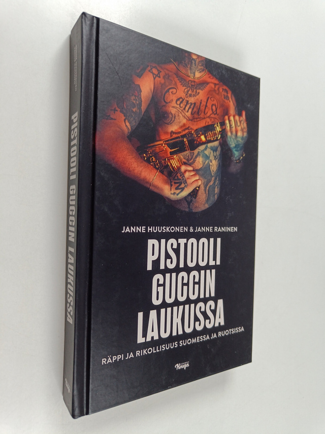 Janne Huuskonen ym. : Pistooli Guccin laukussa