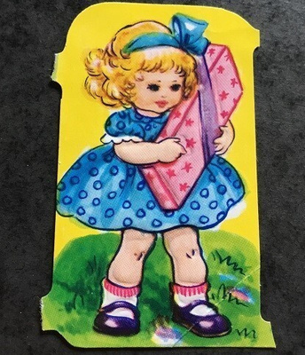 Tyttö ja paketti Kiiltokuva