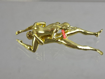 Erotic sculpture figurine in metal