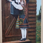 Nuori leidi kansanpuvussa menossa onnittelemaan, p. 1904 - pikkukuva 1