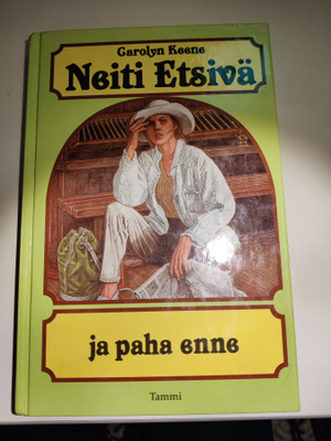 Neiti etsivä ja paha enne Carolyn Keene