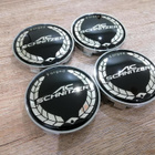 BMW vannekeskiöt – AC Schnitzer Musta-Valko – 68mm (4kpl - pikkukuva 1