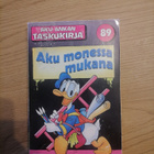 Aku Ankan Taskukirja 89: Aku monessa mukana - pikkukuva 1
