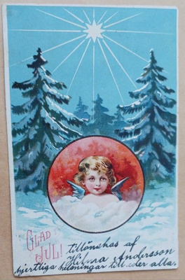 Pieni enkeli ja Joulun tähti kuusien yllä, p. 1920