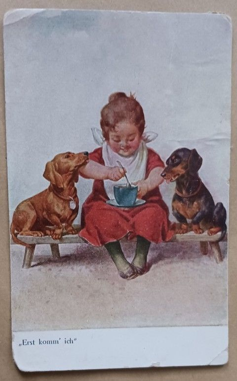 Tyttö ruokailee, mäyräkoirat katselevat, p. 1922