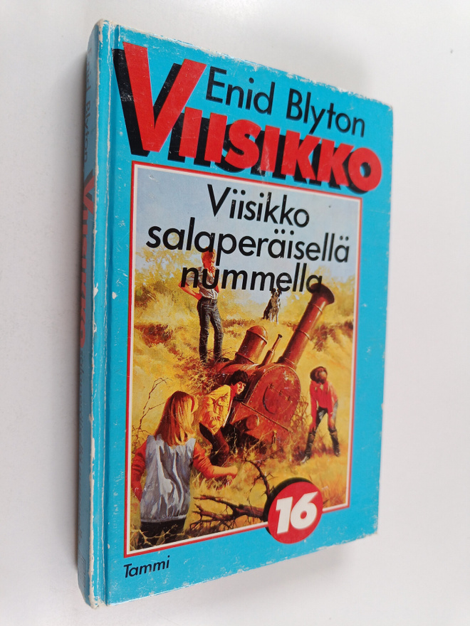 Enid Blyton : Viisikko salaperäisellä nummella