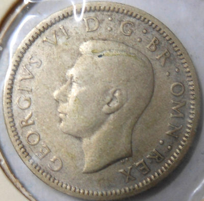 Britania. 6 pence 1944 hopea.
