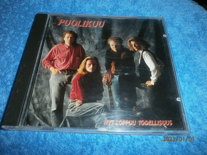 PUOLIKUU : NYT LOPPUU TODELLISUUS   -    CD
