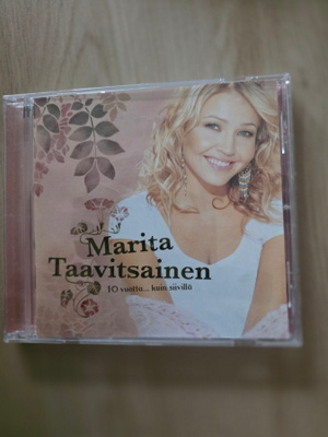 Marita Taavitsainen - 10 vuotta... kuin siivillä