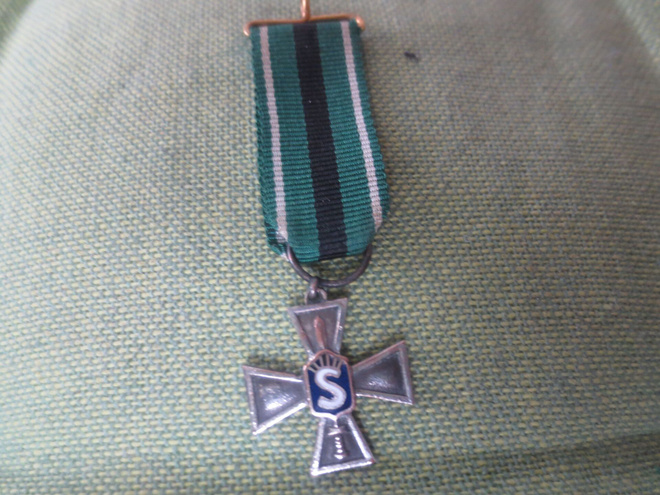 Suojeluskunta Ristin Pienoiskunniamerkki.