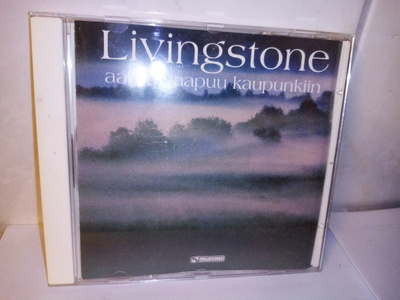 CD LIVINGSTONE :  AAMU SAAPUU KAUPUNKIIN ( SIS POSTIKULU)