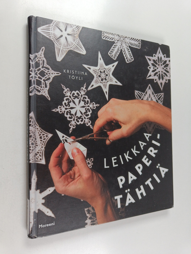 Kristiina Töyli : Leikkaa paperitähtiä