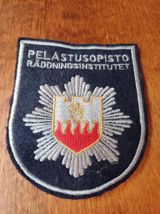 Pelastusopisto kangasmerkki