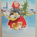 Joulumuori tuo koiran kanssa kuusen ja paketit, p. 1952 - pikkukuva 1