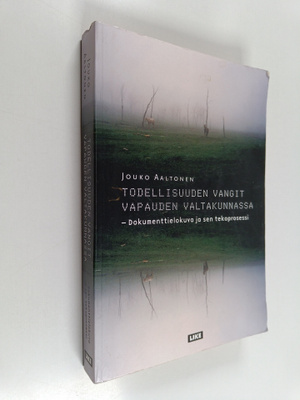 Jouko Aaltonen : Todellisuuden vangit vapauden valtakunna...